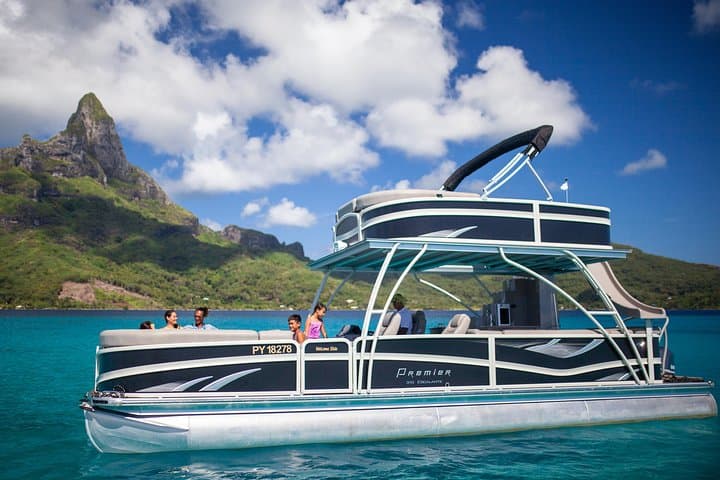 Private Bora Bora Lagoon Tour: Snorkel Rays & Sharks on a Boat with Slide photo 4