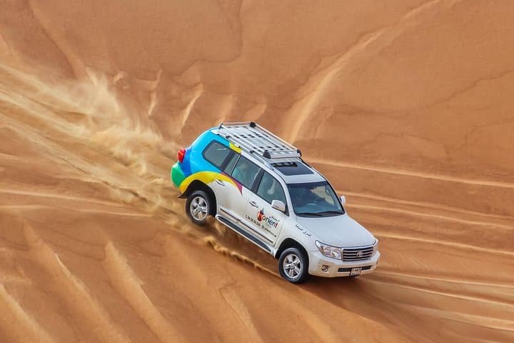 Classic Dubai Desert Safari: Dune Bashing, Camel Rides & BBQ Under the Stars