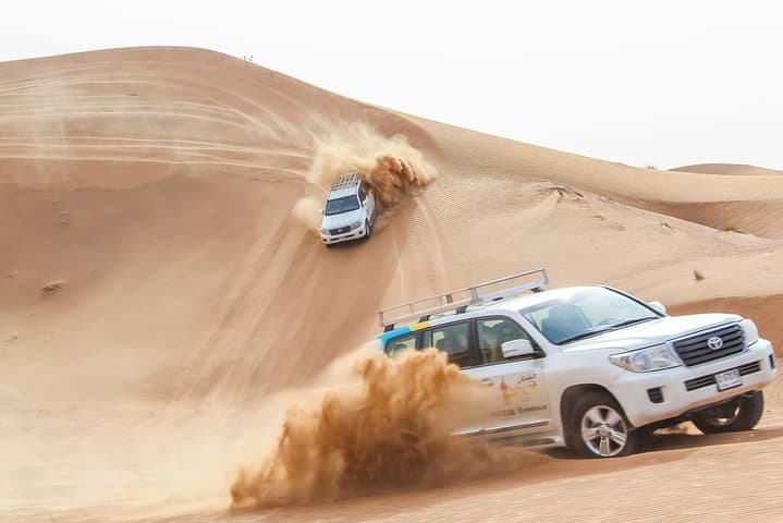 Overnight Dubai Desert Safari: Private 4WD, Sandboarding & Campfire BBQ photo 4