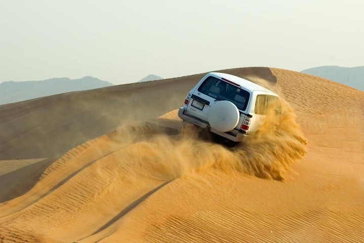 Evening Desert Safari Dubai: Dune Bashing, Camel Rides & Sunset BBQ photo 3