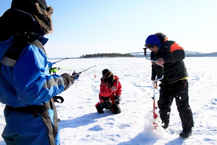 Ice Fishing Safari on Lake Inari from Kakslauttanen: Snowmobile Sleigh & Lappish Lunch