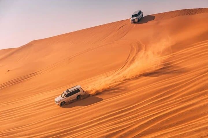 Dubai Desert Safari — Dune Bashing, Sandboarding & Bedouin BBQ Camp