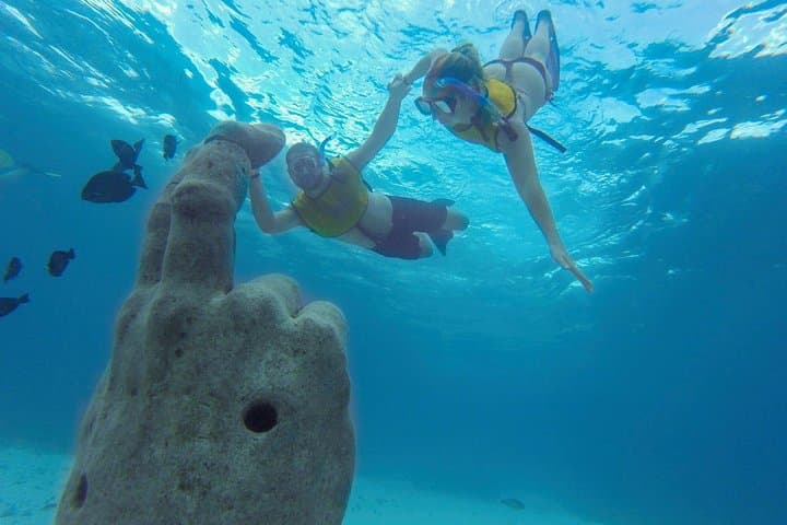 Isla Mujeres Catamaran Snorkel Tour with Free Transport and Open Bar photo 2