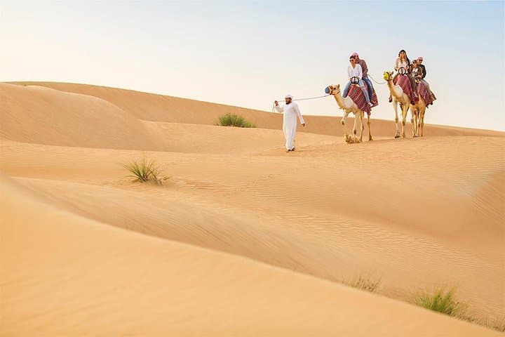 Morning Red Dunes Safari in Dubai — Camel Ride, Dune Bashing & Sandboarding photo 3
