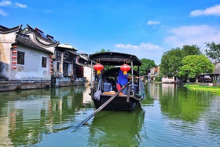 Private Hangzhou & Xitang Day Tour — West Lake, Longjing Tea & Ancient Water Town photo 2