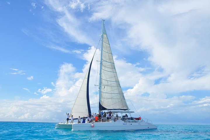 Sail to Isla Mujeres: Full-Day Catamaran Snorkel & Beach Club Experience photo 2