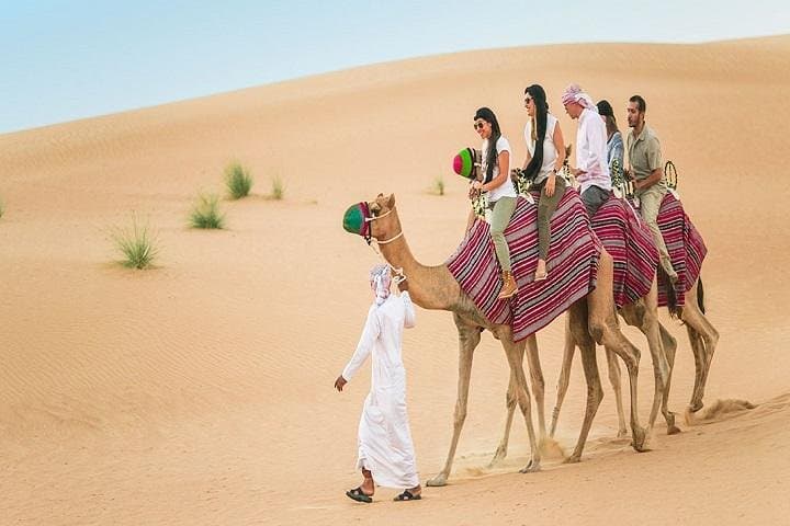 Dubai Morning Desert Quad Bike Tour: Sandboarding & Camel Ride photo 3