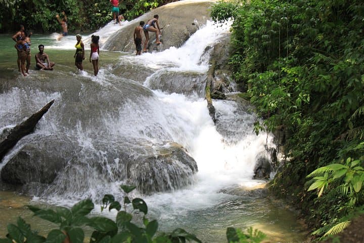 Benta River Falls & Rick's Cafe Day Tour from Grand Palladium — Waterfalls, Mud Baths & Cliff-Jumping in Negril photo 3