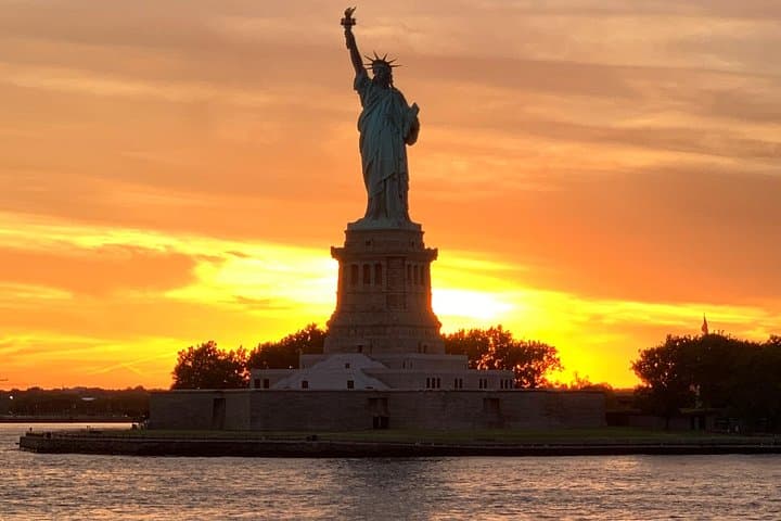 Catch a Magical Sunset on the Statue of Liberty Cruise