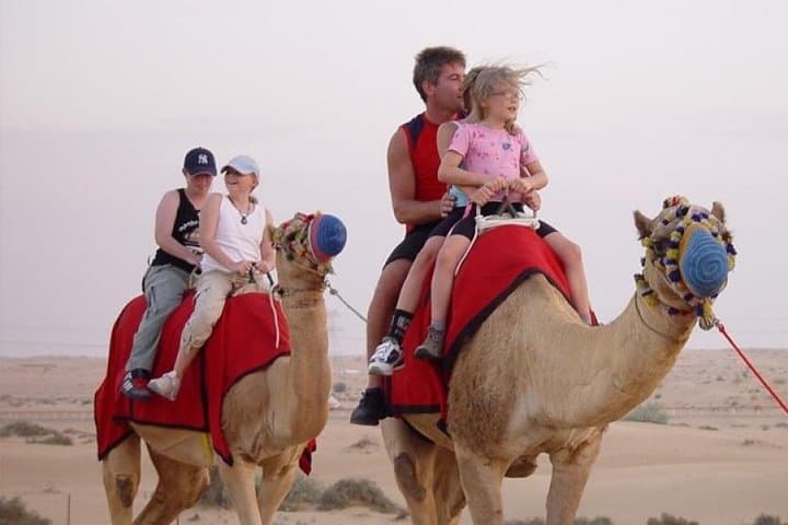 Dubai Camel Trekking & Morning Dune Bashing with Sandboarding photo 2