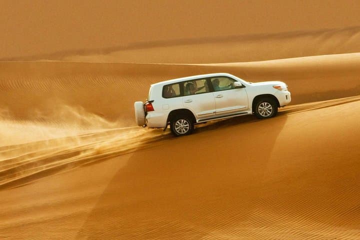 Morning Dubai Desert Dune Bashing & Camel Ride — Half-Day Arabian Desert Safari photo 2
