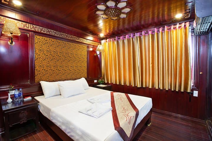 Ha Long Bay 2-Day Cruise: Kayak Bai Tu Long, Cave Visit & Cooking Class photo 2
