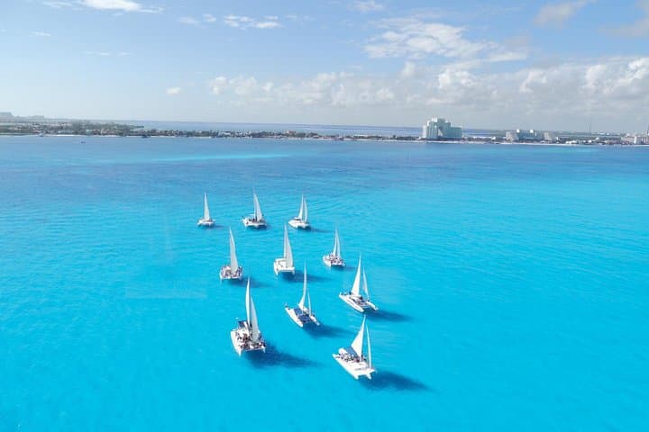 Catamaran to Isla Mujeres: Snorkel Coral Reefs & Beach Club with Hotel Pickup photo 3