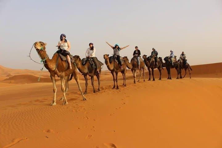 Red-Dune Evening Desert Safari in Dubai — Dune Bashing, Camel Ride & Bedouin Camp