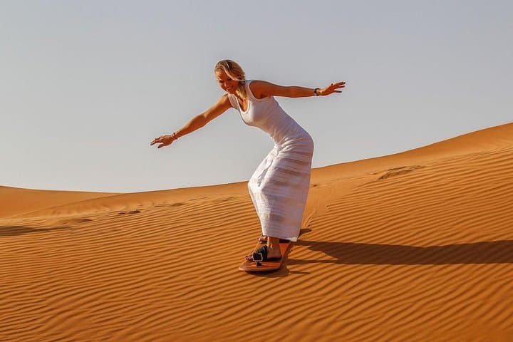 Dubai Evening Desert Safari: Dune Bashing, Camel Rides & BBQ Sunset Experience photo 2