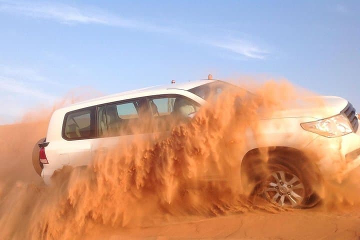 Morning Dubai Desert Safari: Camel Ride, Sandboarding & Dune Bashing at Sunrise photo 2