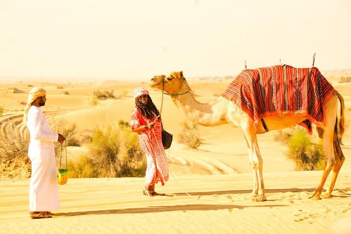 Morning Camel Trek & Sandboarding in Dubai’s Red Dunes — Sunrise Safari with Falcon Photos photo 6