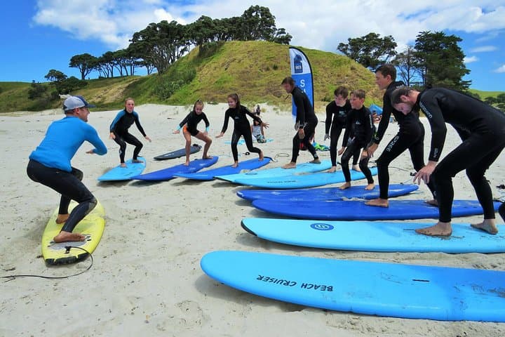 Beginner Surf Lesson at Te Arai Beach — Learn to Ride Auckland's Gentle Waves photo 4