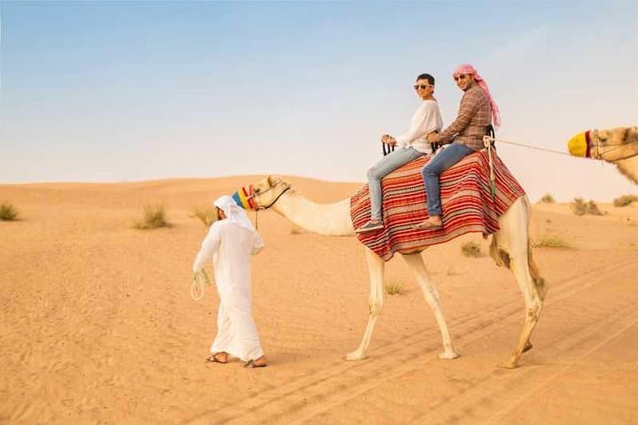 Dubai Premium Desert Safari: Dune Bashing, Camel Ride & BBQ Experience photo 2