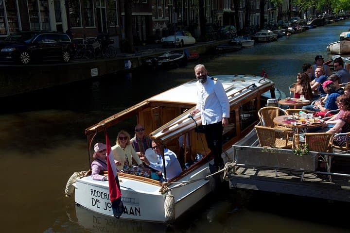 Historic Salon Boat Canal Cruise in Amsterdam: Private 2-Hour Guided Tour photo 4