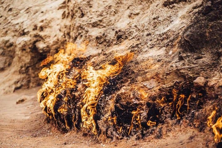 Fire and Stone: Full-Day Qobustan, Mud Volcanoes, Ateshgah & Yanar Dag Tour from Baku photo 3