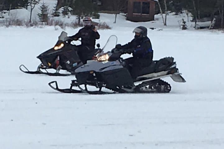 Explore Canadian Wilderness on Guided Snowmobile Tours from Calabogie