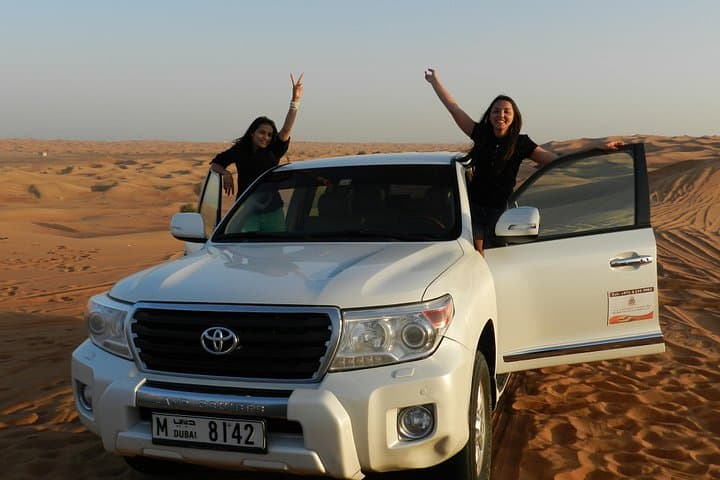 Morning Red Dunes Desert Safari with Camel Ride & Sandboarding — Dubai Adventure photo 4
