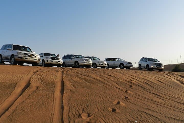Morning Red Dunes Desert Safari: Quad Biking & Sandboarding in Dubai