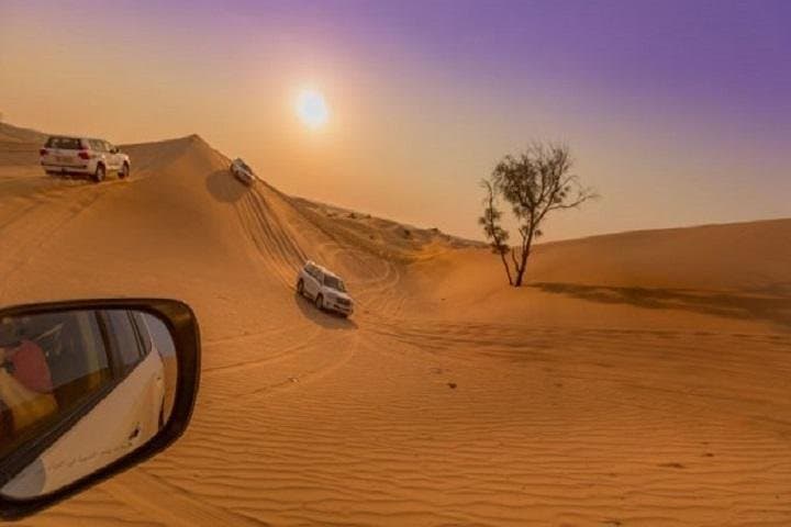 Sunset Red Dunes 4x4 Camel Safari with BBQ Dinner in Dubai photo 4