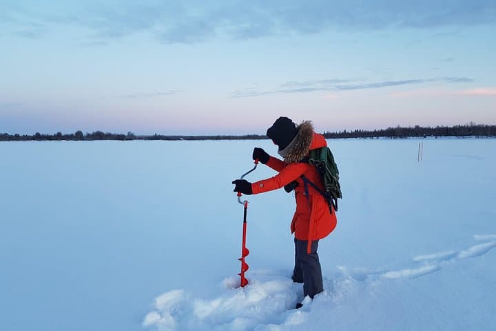 Ice Fishing at Pyhä‑Luosto: Guided Car Pickup, Hot Drinks & Beginner-Friendly Holes photo 2