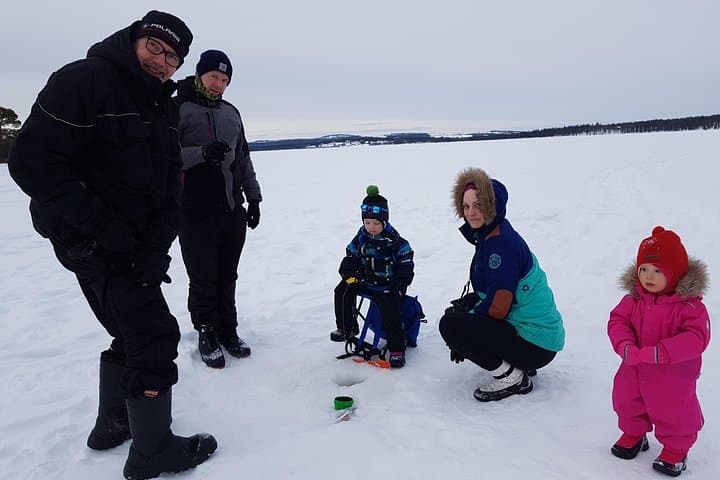 Ice Fishing at Pyhä‑Luosto: Guided Car Pickup, Hot Drinks & Beginner-Friendly Holes photo 3