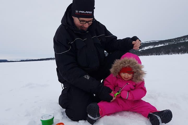 Ice Fishing at Pyhä‑Luosto: Guided Car Pickup, Hot Drinks & Beginner-Friendly Holes photo 4