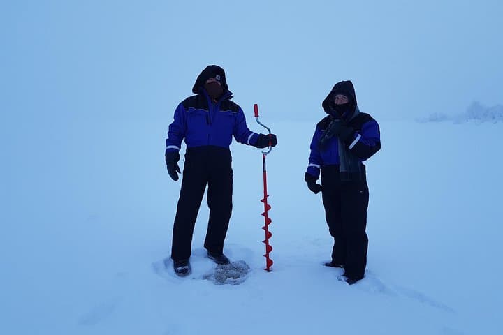 Ice Fishing at Pyhä‑Luosto: Guided Car Pickup, Hot Drinks & Beginner-Friendly Holes photo 5