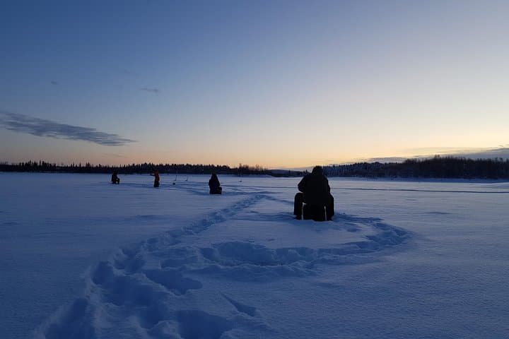 Ice Fishing at Pyhä‑Luosto: Guided Car Pickup, Hot Drinks & Beginner-Friendly Holes photo 6