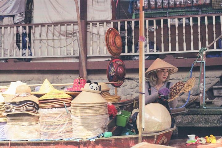 Explore Damnoen Saduak Floating Market & Bridge over the River Kwai: Full-Day Market, Historic Bridge and Death Railway Ride photo 2