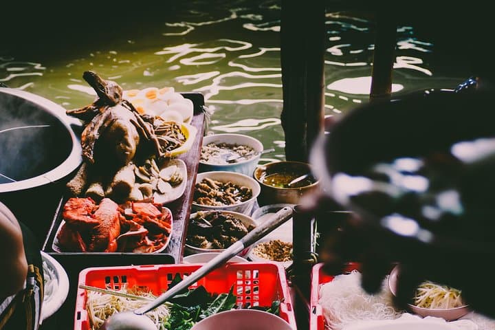 Explore Damnoen Saduak Floating Market & Bridge over the River Kwai: Full-Day Market, Historic Bridge and Death Railway Ride photo 4