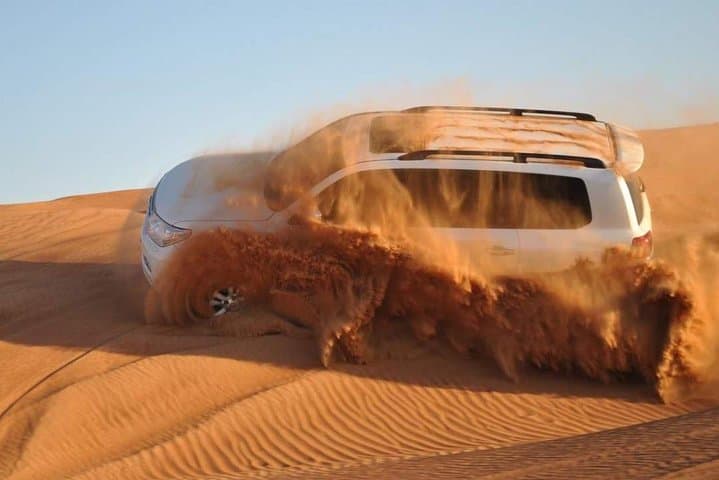 Evening Desert Safari and BBQ in Dubai: Dune Bashing, Camel Rides & Live Shows photo 1