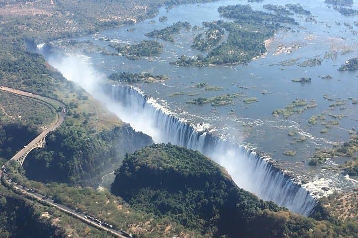 Private Victoria Falls Airport Transfer — Air-Conditioned Ride Through Wild Roadside photo 6