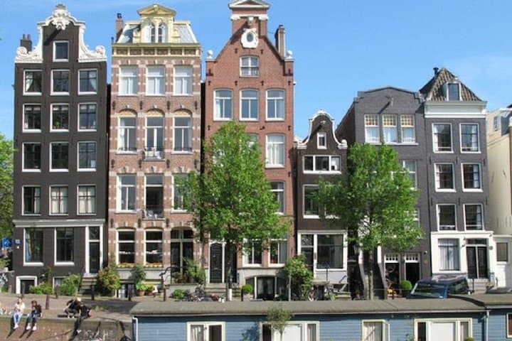 Stroll Through Amsterdam: 3.5‑Hour Extended Walking Tour of Canals, History & Jordaan