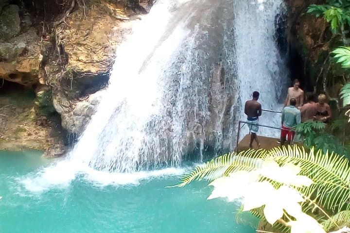 Negril to Ocho Rios: Blue Hole & Dunn's River Waterfall Adventure with Lunch and Local Markets photo 4