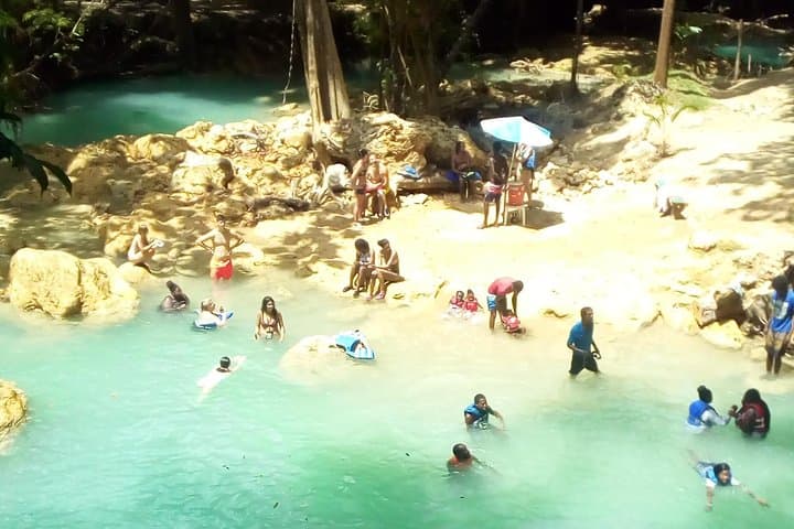 Negril to Ocho Rios: Blue Hole & Dunn's River Waterfall Adventure with Lunch and Local Markets photo 5