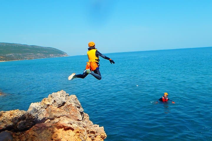 Soft Coasteering at Portinho da Arrábida: Cliff Jumps, Caves & Coastal Swim