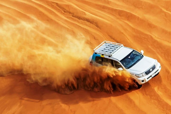Sunset Dune Safari in Abu Dhabi: 4x4 Dune Bashing, Camel Ride & BBQ Camp Experience