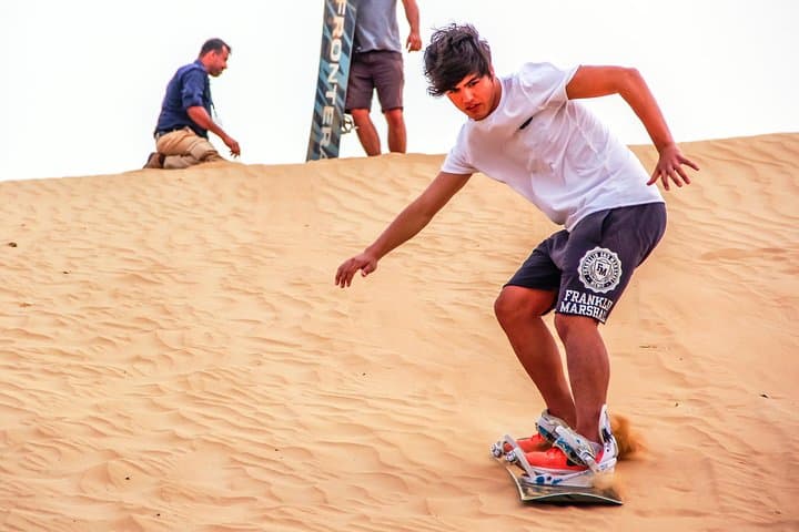 Abu Dhabi Morning Desert Safari: Camel Ride, Sand‑Boarding & Dune Bashing photo 2