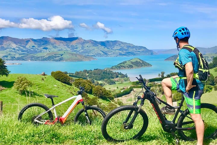 Explore Akaroa by Electric Mountain Bike and Sea Kayak: A Full-Day Guided Adventure
