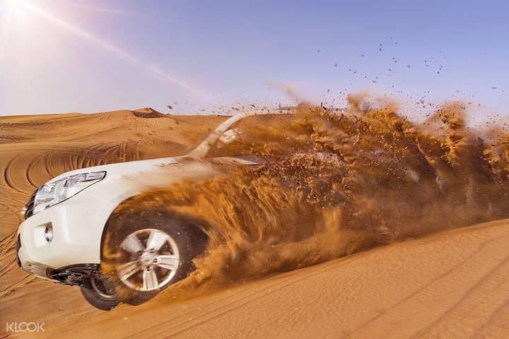 Morning Abu Dhabi Desert Safari: Camel Ride, Sand-Boarding & Dune Drive