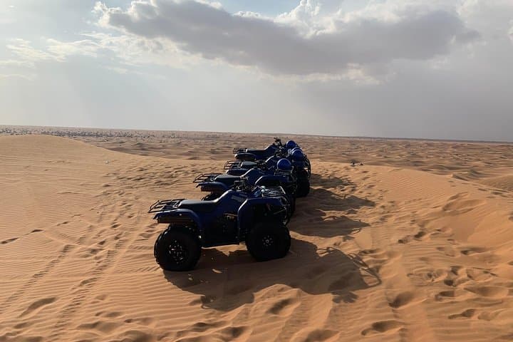 Sunset Quad Bike Safari on Dubai's Red Dunes — Sandboarding, Camels & Desert Camp photo 6