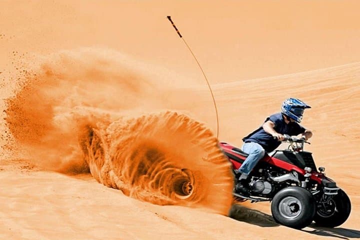 Dubai Evening Desert Safari: Dune Bashing, ATV Quad Ride & BBQ Under the Stars photo 1
