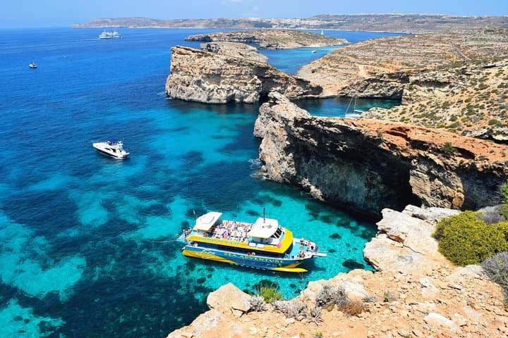 Blue Lagoon Sunset Catamaran Cruise: Evening Swim, Snorkel & Comino Caves