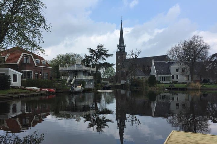 Explore Zaanse Schans: Private Half-Day Windmills, Cheese & Fishing Village Tour from Amsterdam photo 2